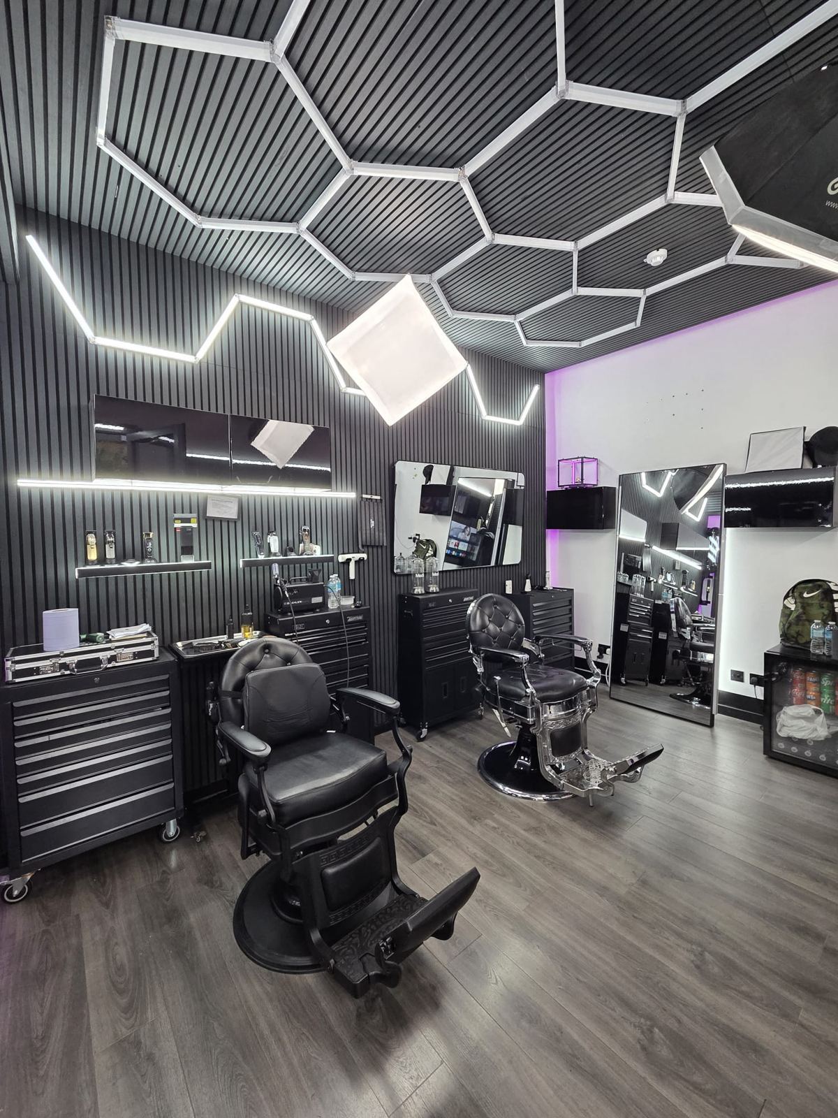 Tool chests and chrome chair under the hexagon ceiling